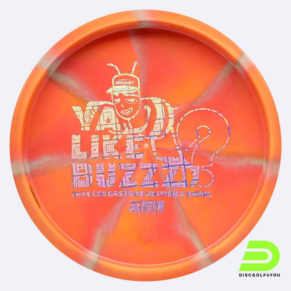 Discraft Buzzz 2024 Ledgestone Edition in classic-orange, x swirly plastic and burst effect Discraft Buzzz 2024 Ledgestone Edition in classic-orange, x swirly plastic and burst effect